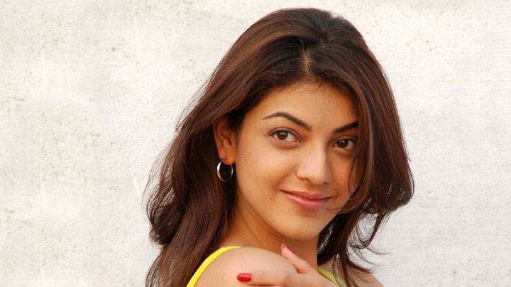 Kajal Aggarwal Smiling Cute Face And Showing Red Nails